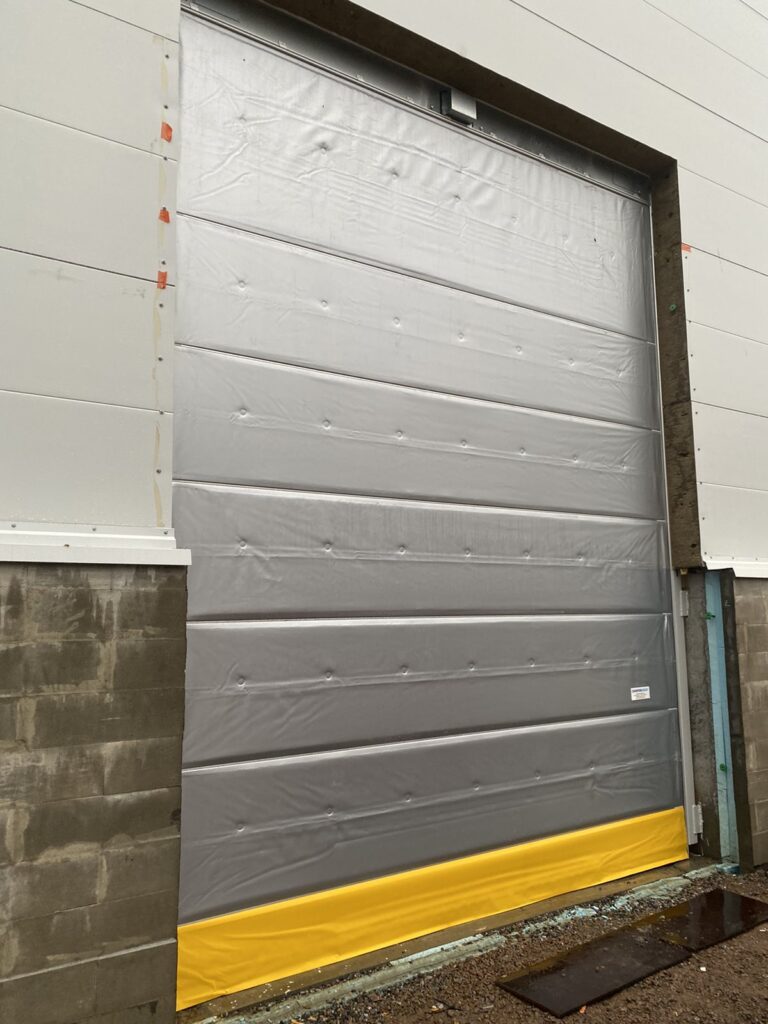 Insulated fabric door
